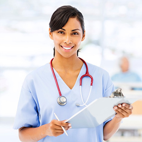 Nurse holding a clip board