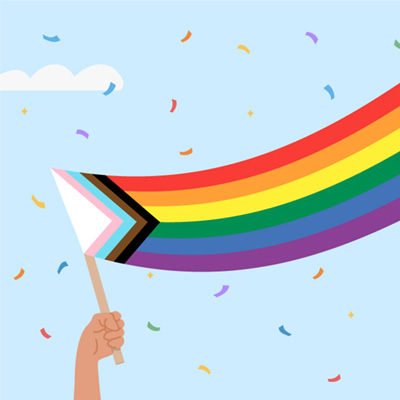 An illustration of a hand holding an LGBTQIA+ Progress Flag