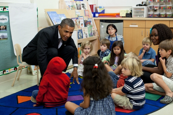 President Barack Obama talks to children at Eastfield College