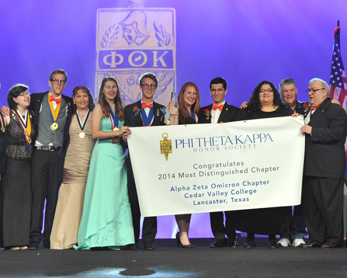 Phi Theta Kappa is presented their award.