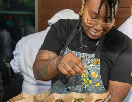 Alt: A photo of a chef at bits and bites