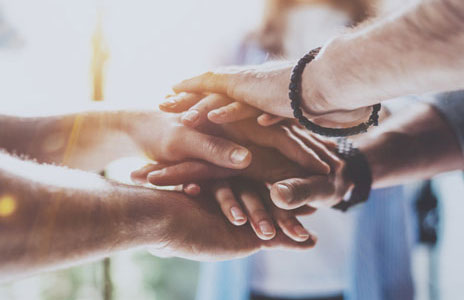 photo of a handshake between two people