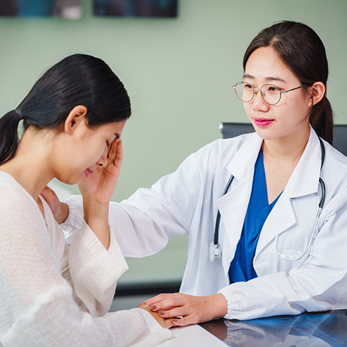 female psychiatric tech consoling female
