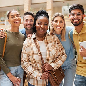 A group of smiling, diverse students