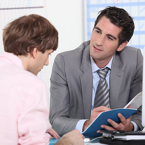 Instructor helping a student