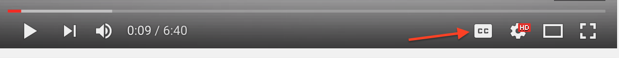 A toolbar on a YouTube video highlights where the closed caption button is.