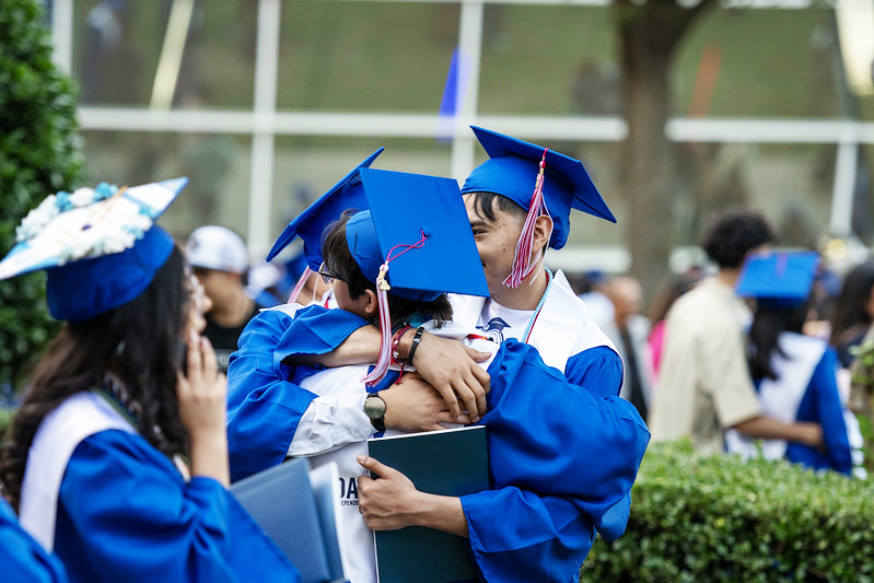 Group of Hugging Grads