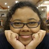 A headshot of Erin England