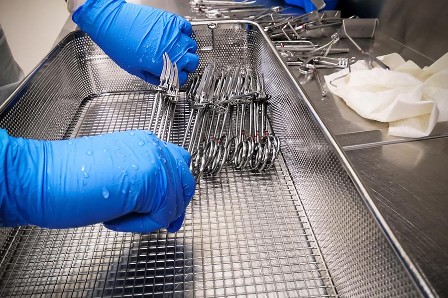 Technician with syringe in a clinic