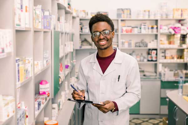 male pharmacy tech smiling