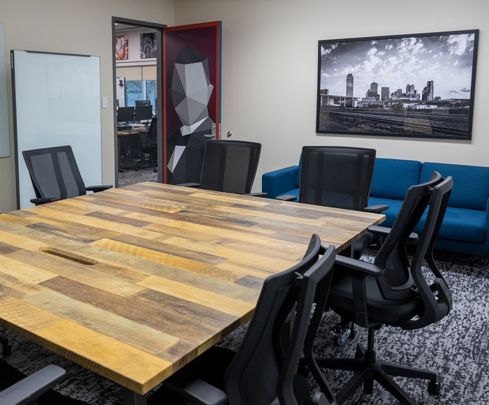An empty table in a conference room in the Venture Club