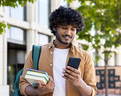 Dallas College student on their phone