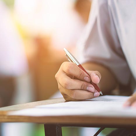 Student in college taking a test