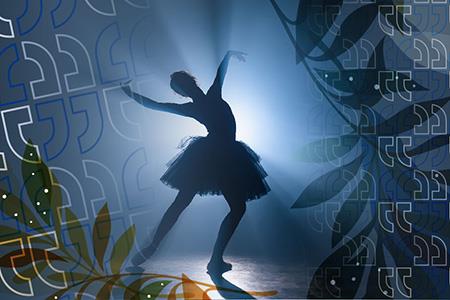 A ballet dancer is silhouetted on the stage