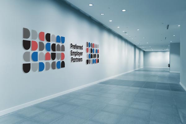 Decorative wall at RedBird Center highlighting preferred employer partners