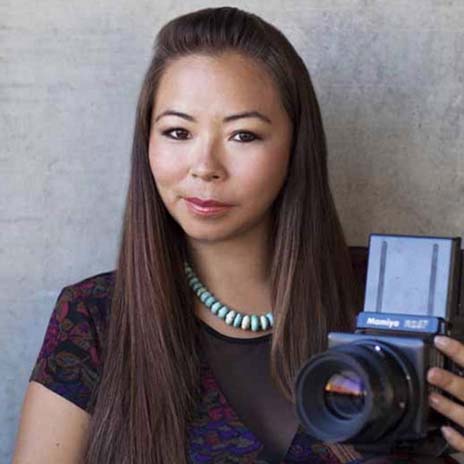 Matika Wilbur with a camera in the photo