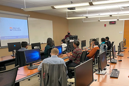 Classroom with presenter and screen