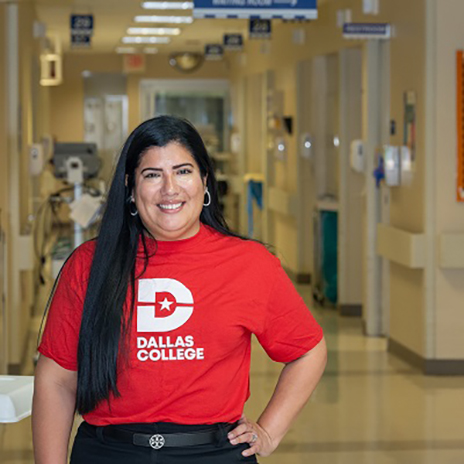 Vanessa Lozada standing in a hospital corridor