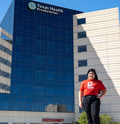 Vanessa Lozada standing in front of hospital