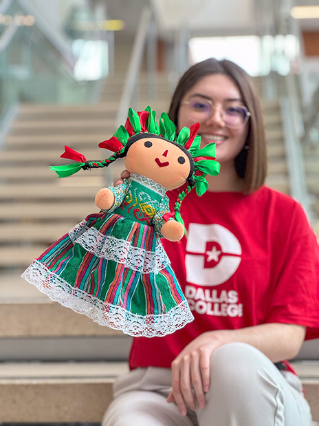 Elisa Ramos holding a doll