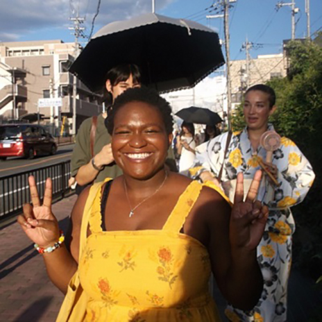 Zoe Phillips walking down street