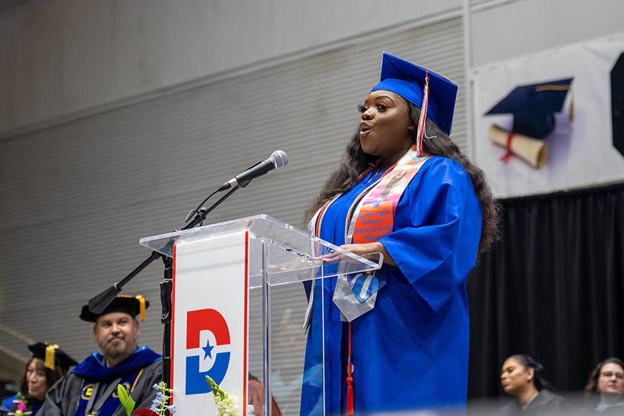 Ariana Dewberry speaking at graduation