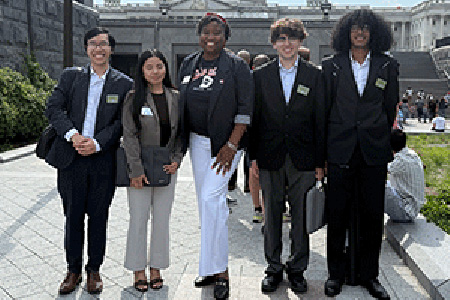 The CCIC Team pose in front of the capital in D.C.