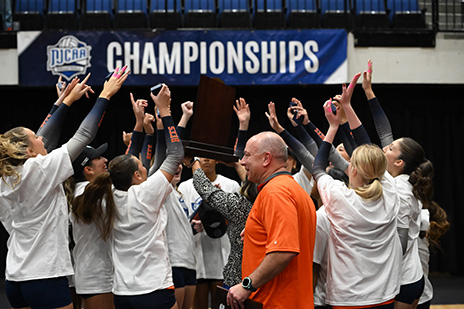 Eastfield volleyball team celebrates after winning championship.