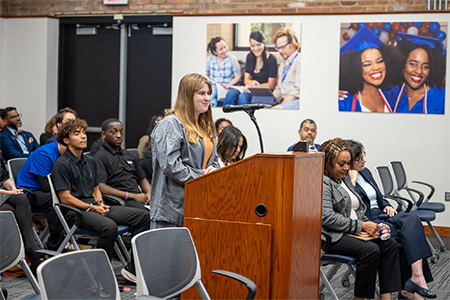 North Lake News-Register Editor in Chief Katelyn Steffen speaks at a Dallas College Board of Trustees meeting.