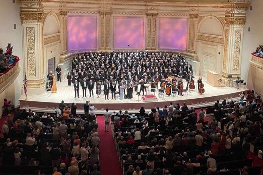 Chorus on stage at Carnegie Hall