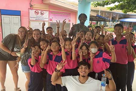 WT students posing with schoolchildren