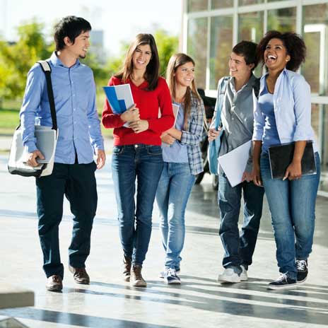 Group of students walking together on campus