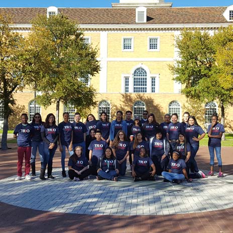 Students of talent search program grouped together smiling at Eastfield