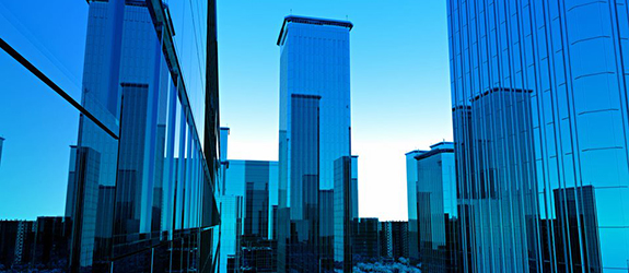 a skyline of a city on very bright blue day
