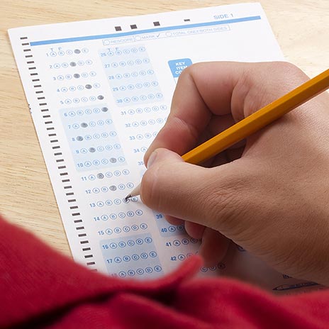 student taking a multiple choice scantron test