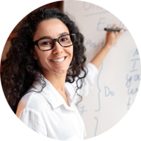 English teacher writing on a whiteboard