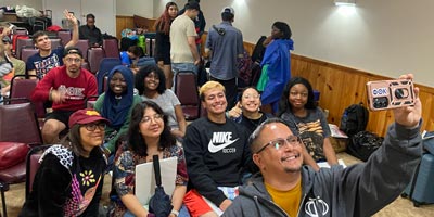 Students take an ussie at a Student Leadership event