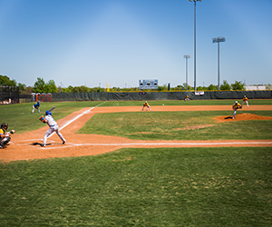 The Mountain View baseball team plays a game with a batter at home ready to swing