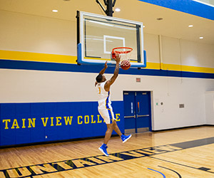 A Mountain View basketball player goes for a layup