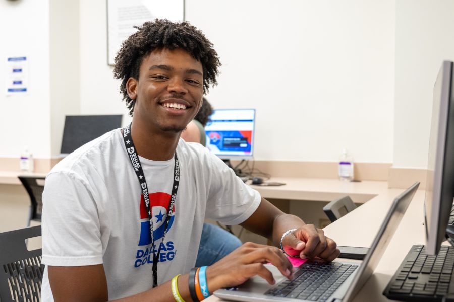 Student studies on a laptop in a computer lab