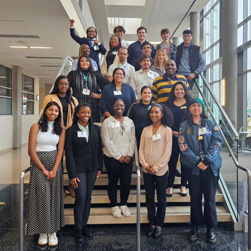 STEM Leadership Academy students pose for a group photo on the stairs at Richland
