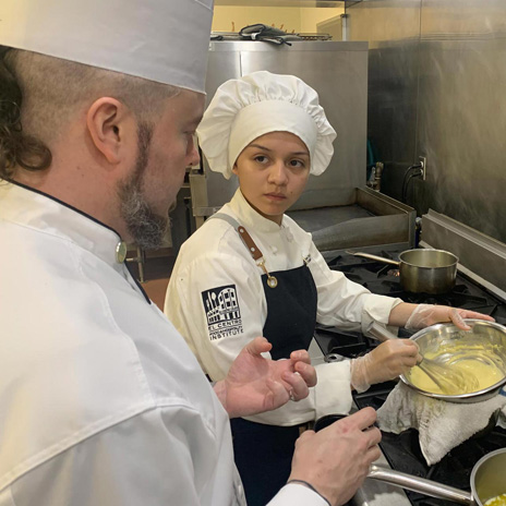 Dallas College culinary students being trained in the kitchen