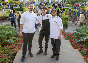 Chefs pose at the Dallas Arboretum during the 2024 Bits & Bites event.