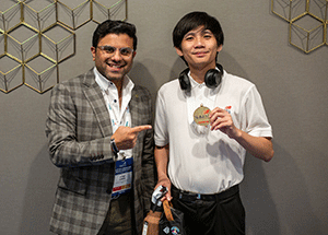 advisor Ayaz Ismail and recent graduate Minh Kieu