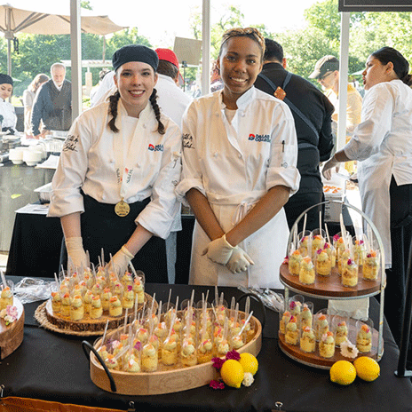 Two Dallas College culinary students at the 2024 Bits & Bites event