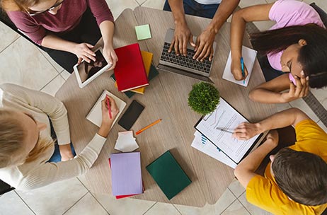 Overhead view of students sitting at a table