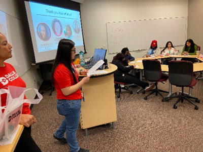 Photo of Health promotion coordinators educating students on Cedar Valley Campus.