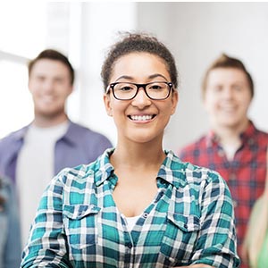 A group of smiling, diverse students